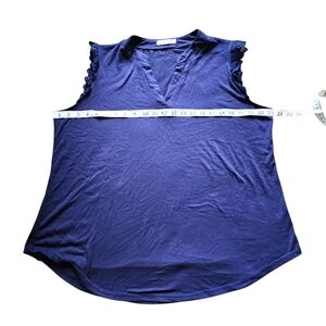 XXL sleeveless blouse with lace on the shoulders and v neck